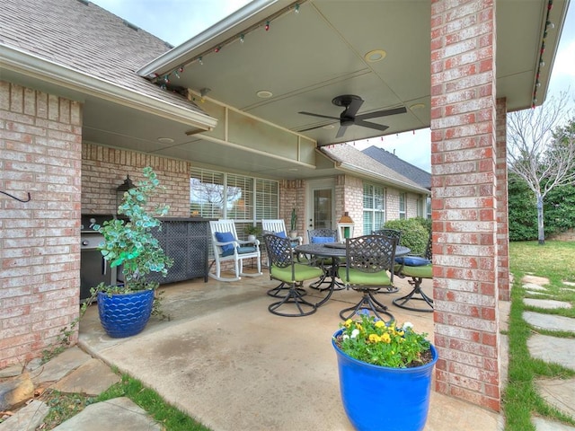 view of patio / terrace featuring outdoor dining area and ceiling fan