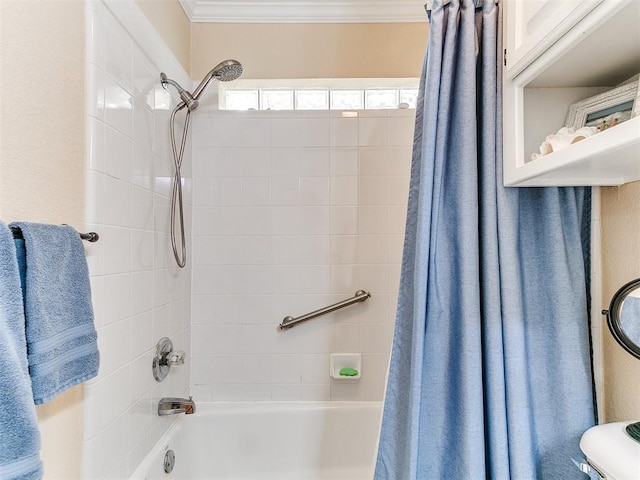 bathroom featuring crown molding and shower / tub combo