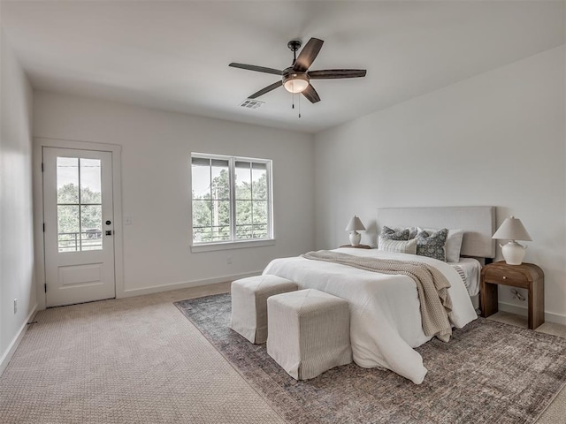 bedroom with baseboards, visible vents, carpet flooring, a ceiling fan, and access to outside