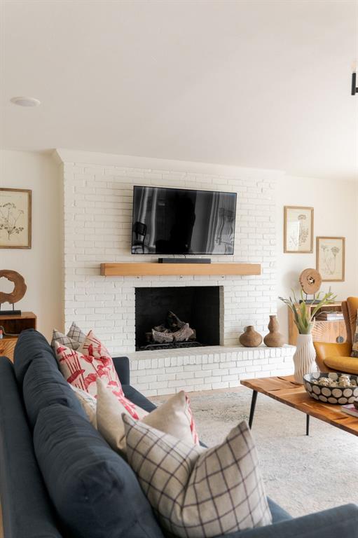 10912 Willow Grove Rd, Oklahoma City, OK 73120 - living room with a brick fireplace