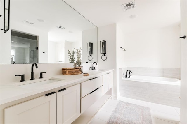 10912 Willow Grove Rd, Oklahoma City, OK 73120 - full bathroom featuring tile patterned flooring, a sink, and visible vents