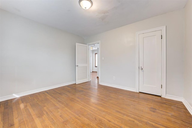 2929 NW 12th St, Oklahoma City, OK 73107 - spare room featuring baseboards and wood-type flooring