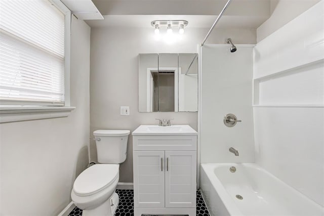 2929 NW 12th St, Oklahoma City, OK 73107 - bathroom with baseboards, shower / tub combination, vanity, and toilet