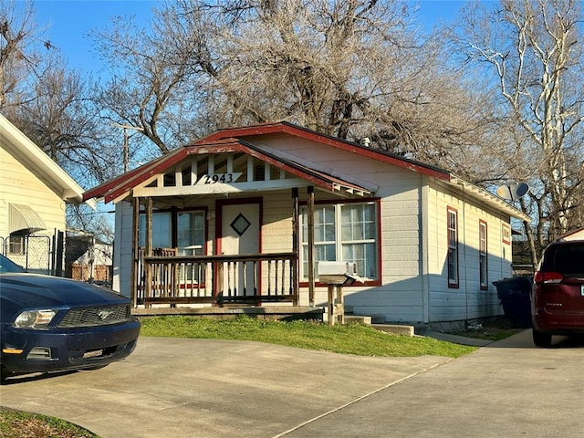 2929 NW 12th St, Oklahoma City, OK 73107 - view of front of home with a porch and concrete driveway