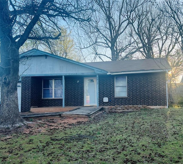 4912 Cinderella Dr, Oklahoma City, OK 73129 - ranch-style house featuring covered porch and brick siding