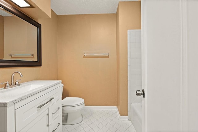 bathroom with toilet, tile patterned floors, vanity, and baseboards