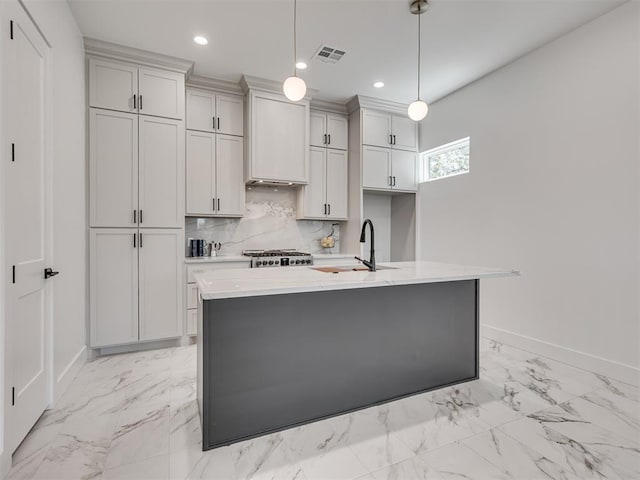 8 S Howard St, Edmond, OK 73003 - kitchen featuring visible vents, a sink, decorative backsplash, stove, and light countertops