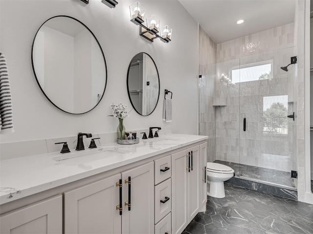 8 S Howard St, Edmond, OK 73003 - full bathroom with toilet, marble finish floor, a sink, a shower stall, and double vanity
