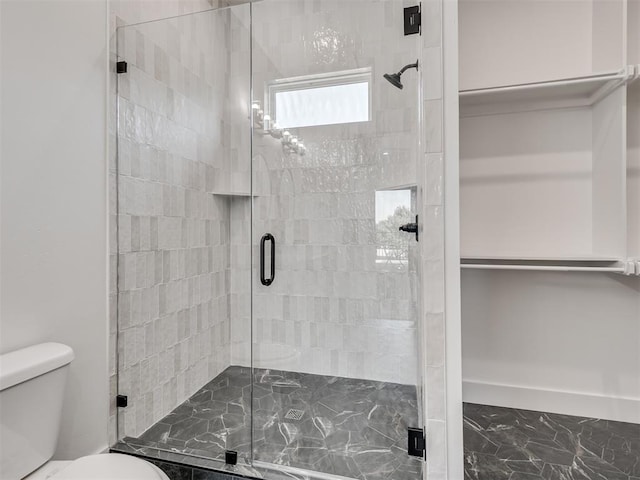 8 S Howard St, Edmond, OK 73003 - full bath with a shower stall, toilet, and marble finish floor