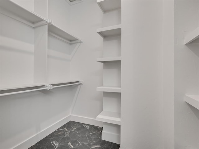 8 S Howard St, Edmond, OK 73003 - walk in closet with marble finish floor