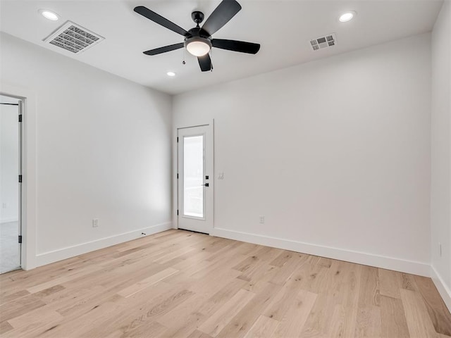 8 S Howard St, Edmond, OK 73003 - spare room with recessed lighting, visible vents, light wood-style flooring, and a ceiling fan