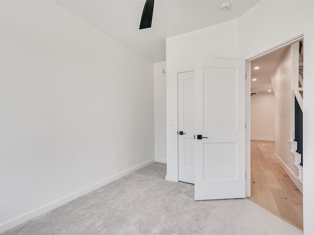 8 S Howard St, Edmond, OK 73003 - unfurnished bedroom featuring recessed lighting, a ceiling fan, light colored carpet, and baseboards