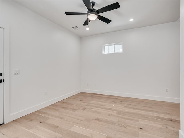 8 S Howard St, Edmond, OK 73003 - unfurnished room featuring baseboards, visible vents, and light wood finished floors