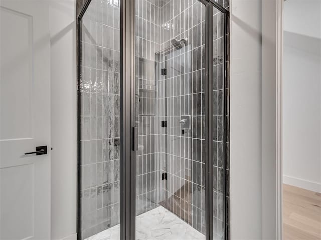 8 S Howard St, Edmond, OK 73003 - bathroom with wood finished floors and a stall shower