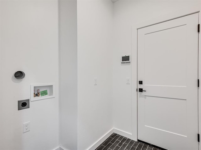 8 S Howard St, Edmond, OK 73003 - laundry room featuring electric dryer hookup, baseboards, hookup for a washing machine, and laundry area