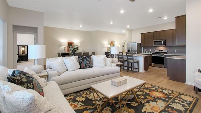 5412 Windstone Ln, Norman, OK 73072 - living room featuring light wood-type flooring and recessed lighting