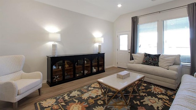5412 Windstone Ln, Norman, OK 73072 - living area featuring lofted ceiling and wood finished floors