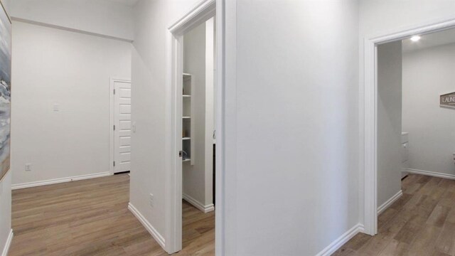 5412 Windstone Ln, Norman, OK 73072 - hall featuring wood finished floors