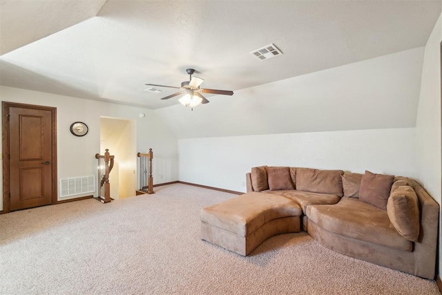 1216 Camelot Dr, Yukon, OK 73099 - living area featuring vaulted ceiling, carpet floors, a ceiling fan, and baseboards