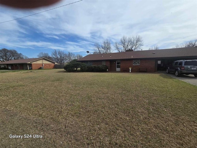 506 E Oklahoma St, Walters, OK 73572 - view of yard with driveway