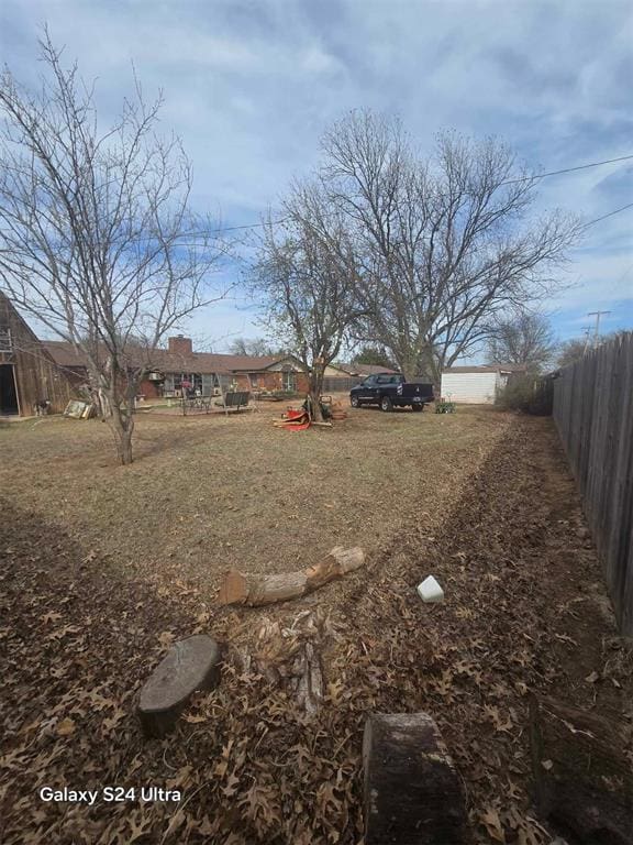 506 E Oklahoma St, Walters, OK 73572 - view of yard featuring fence