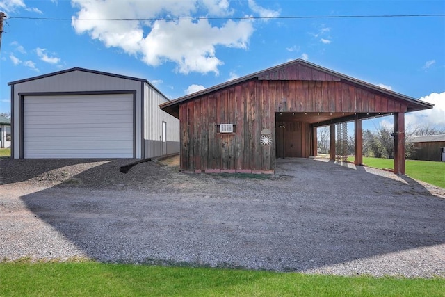 9872 N 2121st Pl, Butler, OK 73625 - garage with a detached garage and gravel driveway