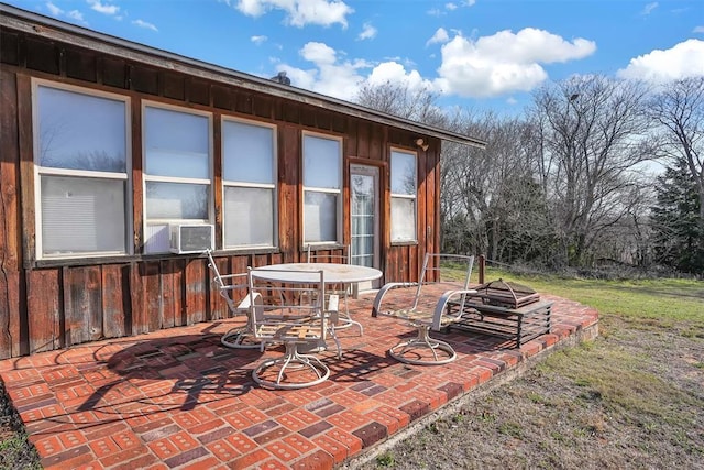 9872 N 2121st Pl, Butler, OK 73625 - view of patio / terrace with cooling unit and a fire pit