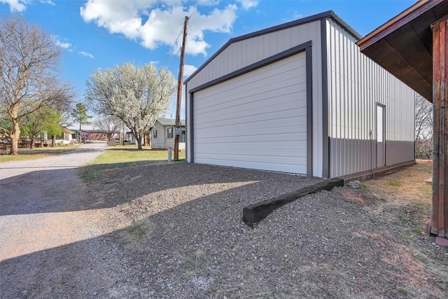 9872 N 2121st Pl, Butler, OK 73625 - garage featuring gravel driveway