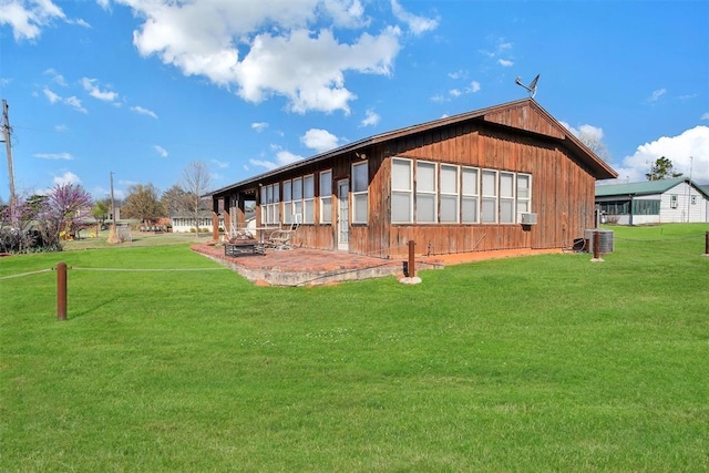 9872 N 2121st Pl, Butler, OK 73625 - back of house with a yard, a patio, and cooling unit