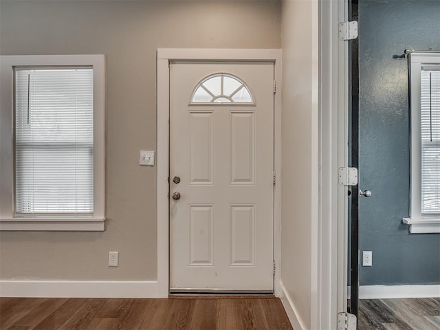1604 NE Euclid St, Oklahoma City, OK 73117 - entrance foyer with baseboards and wood finished floors