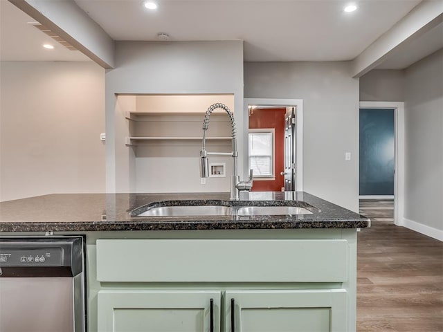 1604 NE Euclid St, Oklahoma City, OK 73117 - kitchen with green cabinetry, stainless steel dishwasher, wood finished floors, and a sink