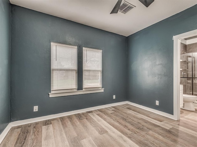 1604 NE Euclid St, Oklahoma City, OK 73117 - unfurnished room featuring visible vents, baseboards, and wood finished floors