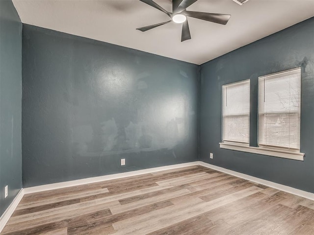1604 NE Euclid St, Oklahoma City, OK 73117 - spare room with baseboards, wood finished floors, and ceiling fan