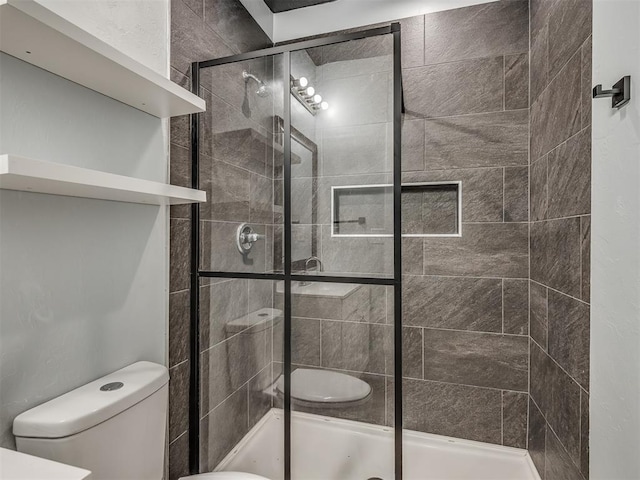 1604 NE Euclid St, Oklahoma City, OK 73117 - bathroom featuring a stall shower and toilet