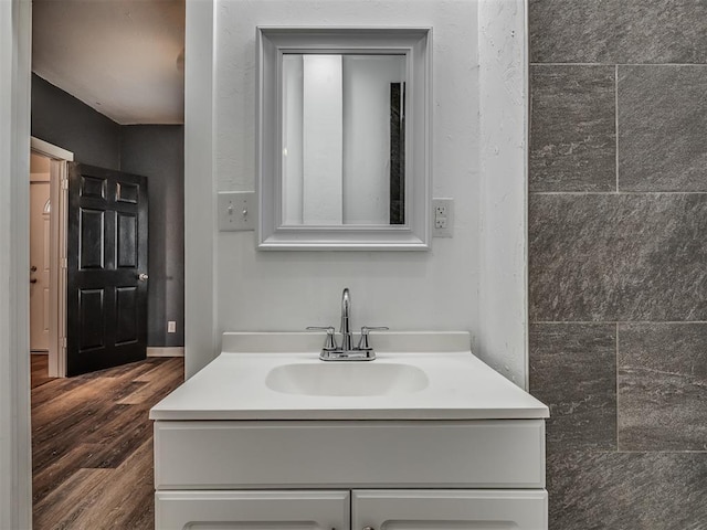 1604 NE Euclid St, Oklahoma City, OK 73117 - bathroom featuring vanity and wood finished floors