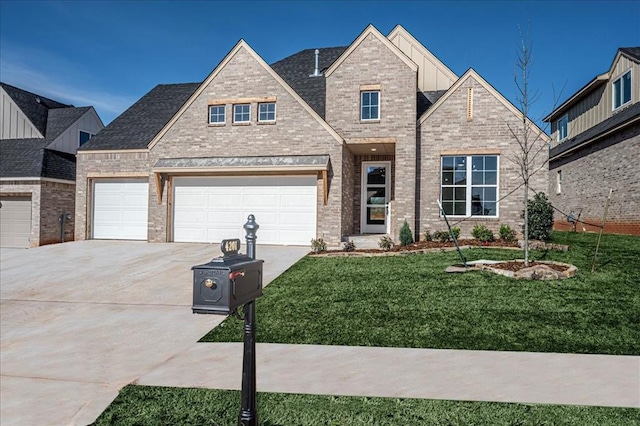 4201 Emery Dr, Edmond, OK 73034 - view of front of property featuring concrete driveway, a front yard, and brick siding