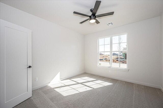 4201 Emery Dr, Edmond, OK 73034 - carpeted spare room with ceiling fan and baseboards