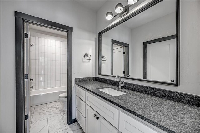 4201 Emery Dr, Edmond, OK 73034 - full bathroom featuring toilet, vanity, marble look tile flooring, and tub / shower combination