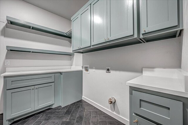 4201 Emery Dr, Edmond, OK 73034 - laundry area featuring cabinet space, washer hookup, hookup for an electric dryer, and baseboards