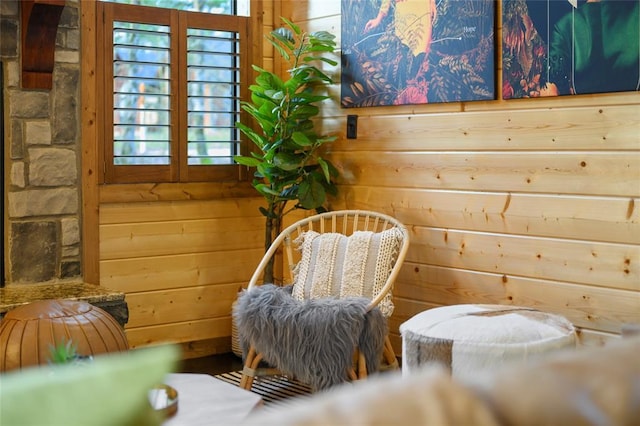 sitting room with wood walls