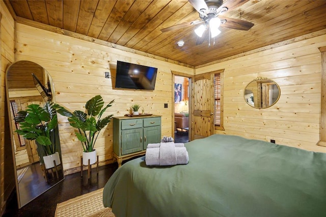 bedroom featuring wooden ceiling, wooden walls, and dark wood-style floors