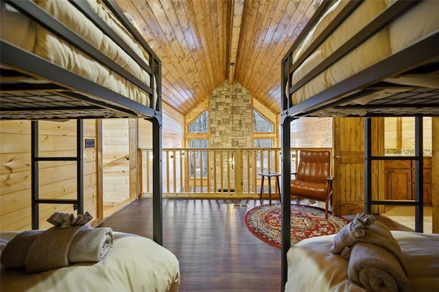 living area featuring wood ceiling, wood finished floors, and wooden walls