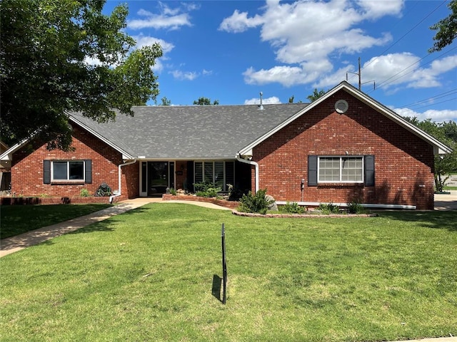 10900 Willow Grove Rd, Oklahoma City, OK 73120 - ranch-style home featuring brick siding, a front lawn, and a shingled roof