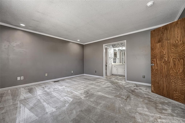 10900 Willow Grove Rd, Oklahoma City, OK 73120 - unfurnished room with carpet flooring, a textured ceiling, ornamental molding, recessed lighting, and baseboards