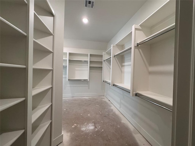 walk in closet with visible vents
