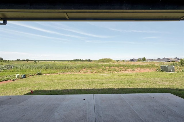 9321 NW 147th Ter, Yukon, OK 73099 - view of green lawn with a patio area