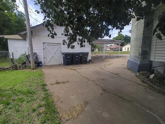 2005 E Cherokee Ave, Enid, OK 73701 - view of property exterior with a carport