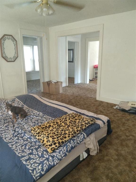 2005 E Cherokee Ave, Enid, OK 73701 - bedroom with carpet and a ceiling fan