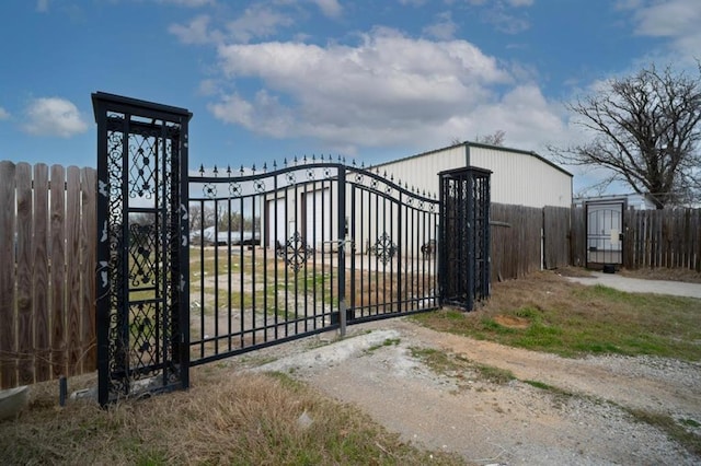 1333 W 1st St, Wewoka, OK 74884 - view of gate featuring fence