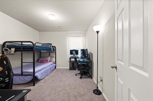bedroom with visible vents, baseboards, and carpet flooring